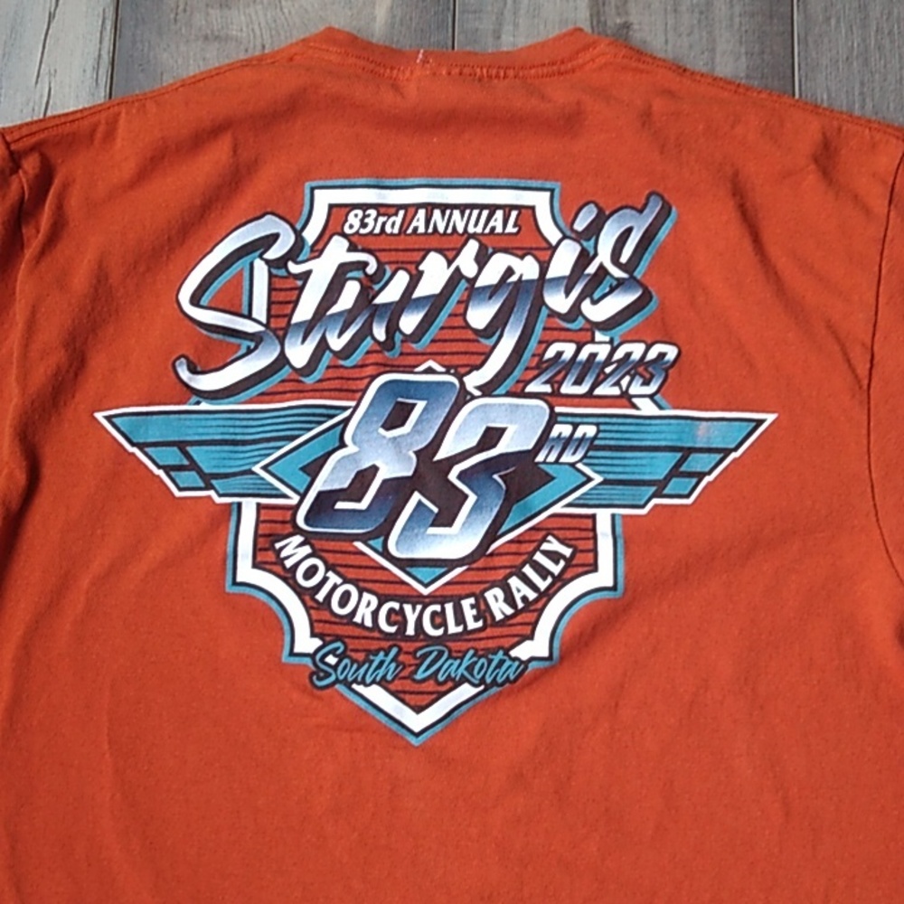 2023 Sturgis long sleeve orange t-shirt with graphics on front and back